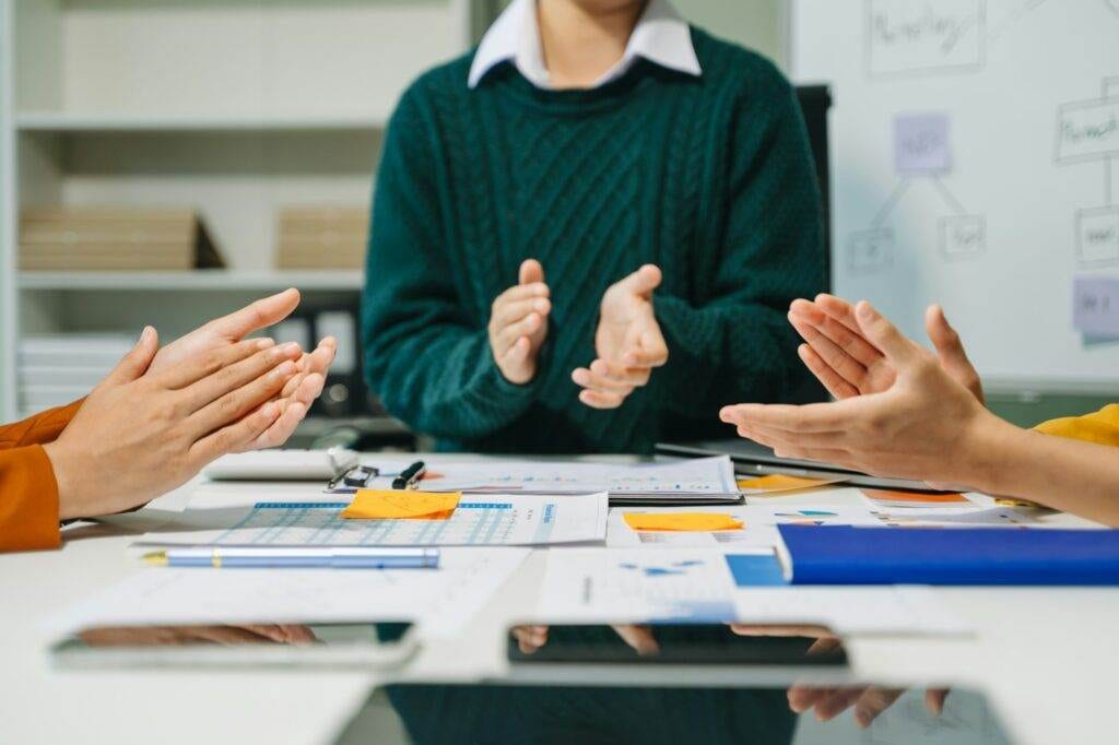 Close up on hands of business people join together their hands together on unity concept